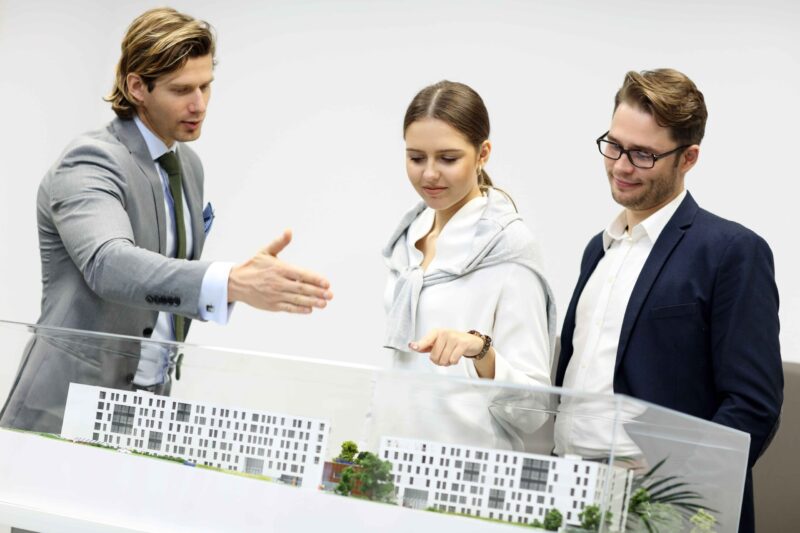 International architects and investors discussing Dubai’s skyline developments, symbolizing the insider access provided during Exclusive Luxe Tours property tours.