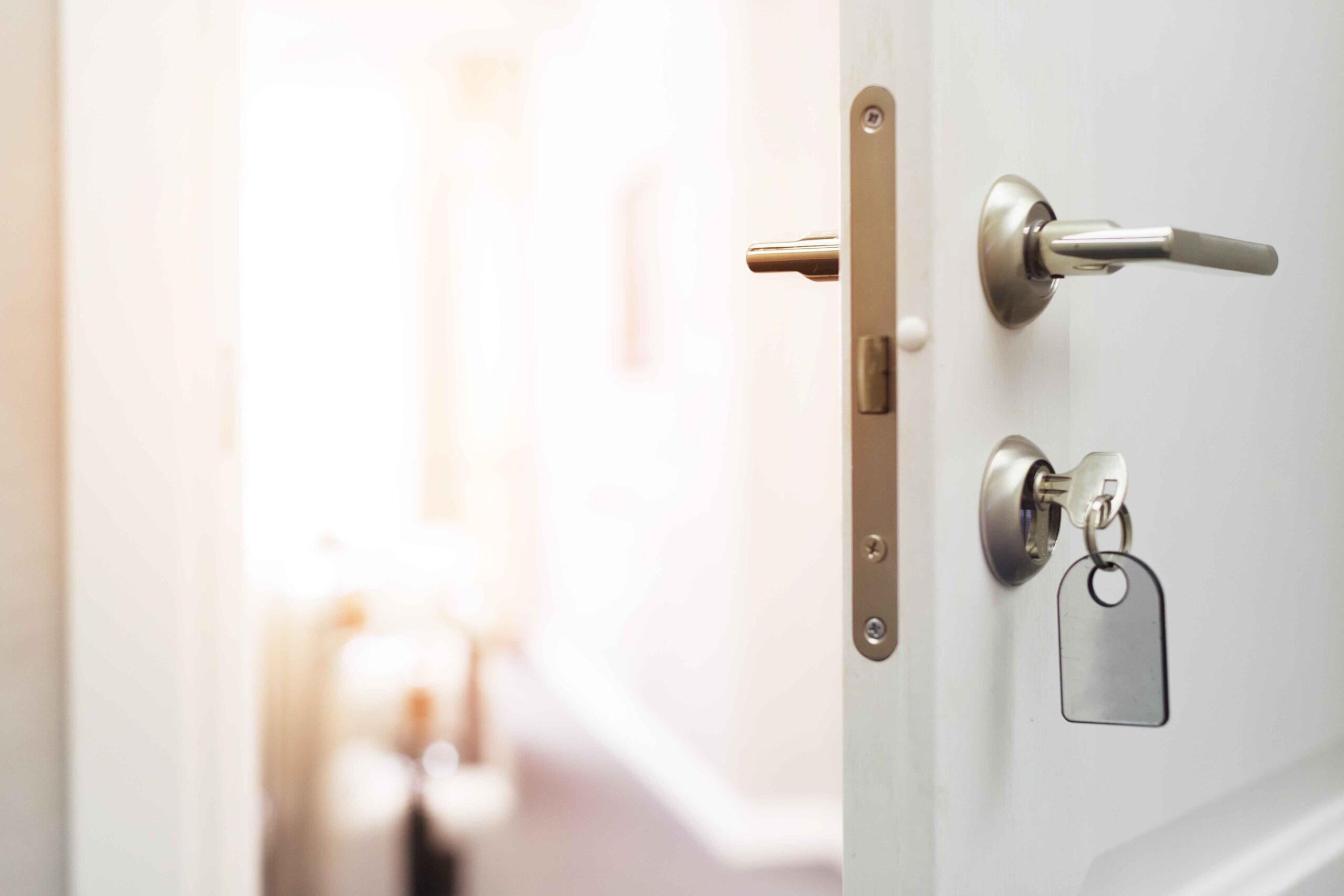 Open door with a key in the lock, symbolizing how Exclusive Luxe Tours serves as the gateway to opportunity, access, and trusted global partnerships.